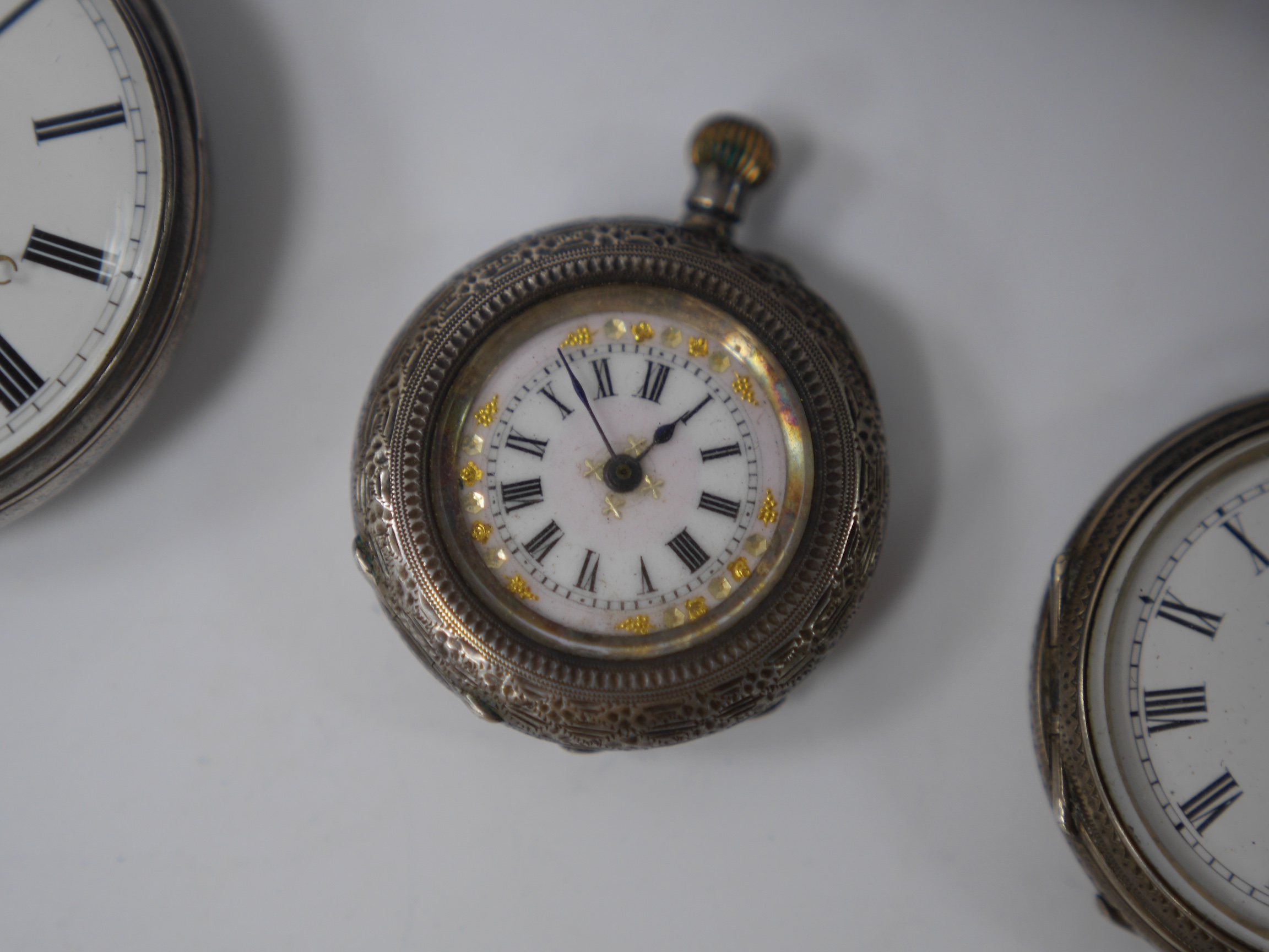 Six assorted pocket and fob watches, including a Victorian silver open faced, case diameter 62mm, a silver half hunter pocket watch with a silver albert and a small plated bosun's call. Condition - poor to fair to good